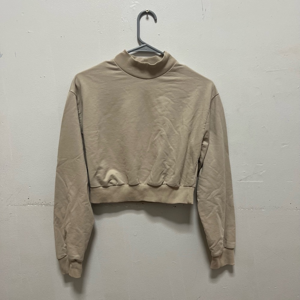 tan turtleneck